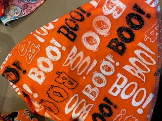 HALLOWEEN_BOO! on orange scrub hat