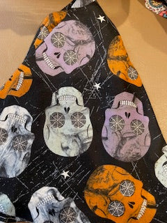 HALLOWEEN_Multicolor Skulls on Black Fabric Scrub Hats